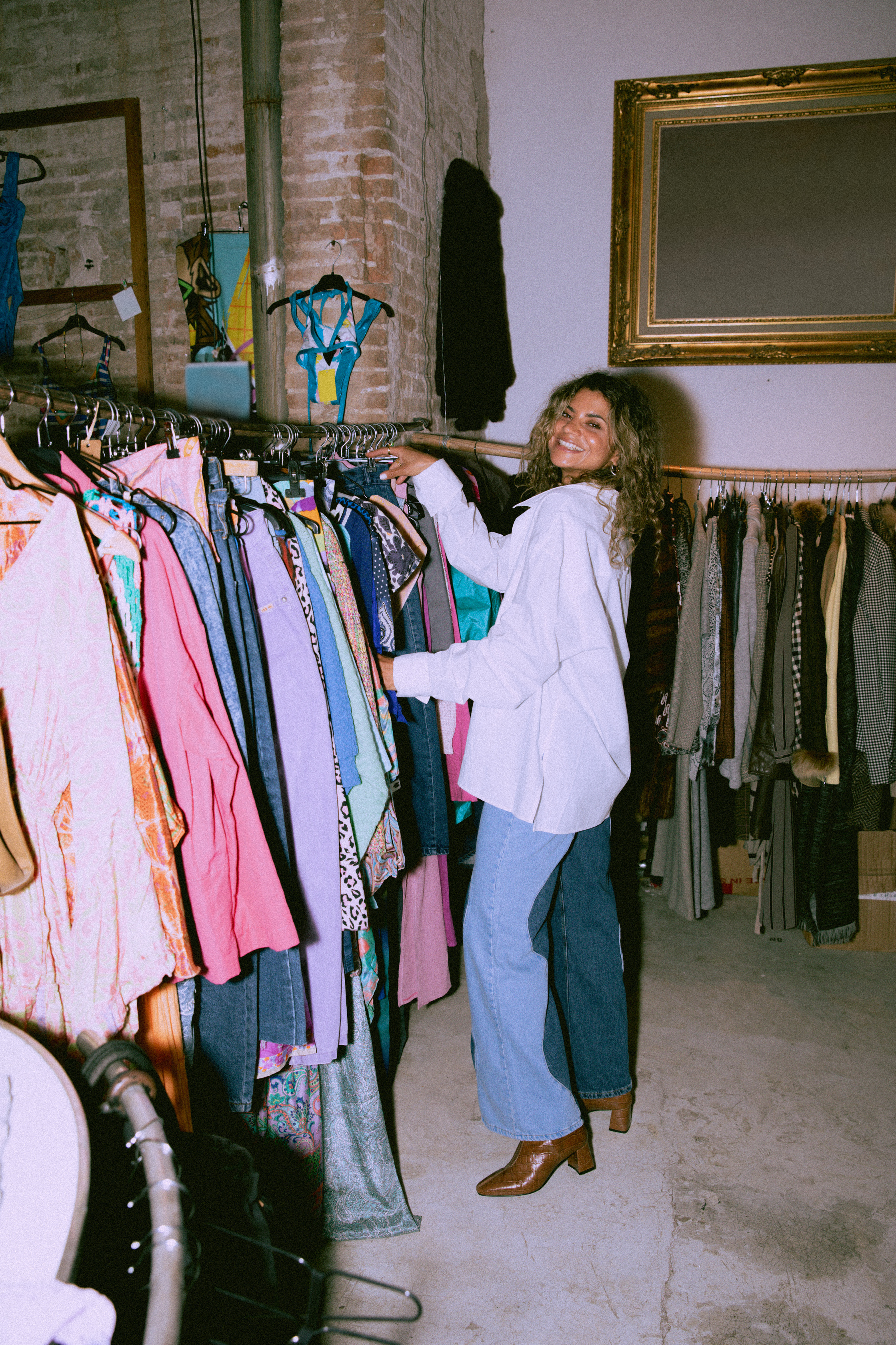 Young Woman Thrifting in a Vintage Clothing Store